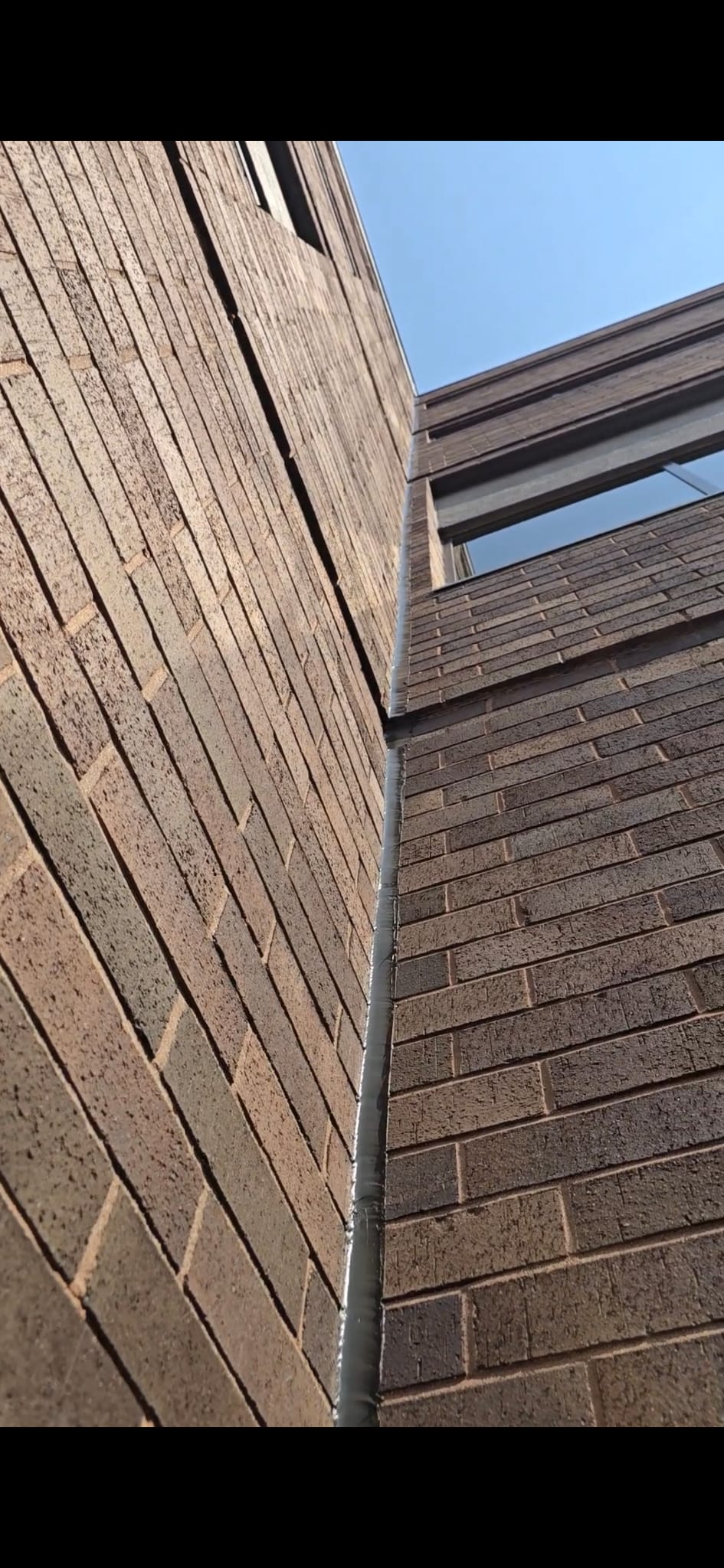 Wide expansion joint sealed on a commercial building in Waltham