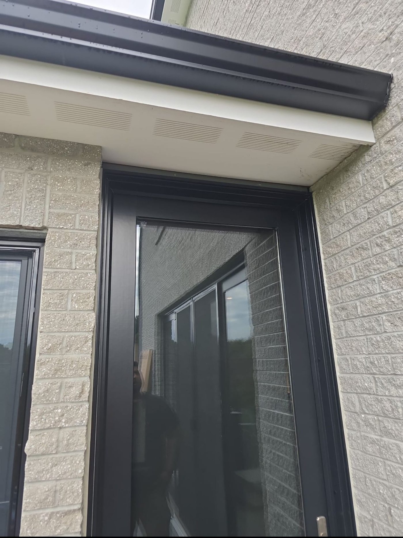 Residential doorway sealed against drafts and moisture